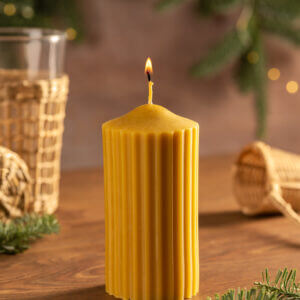 cylindrical beeswax candle