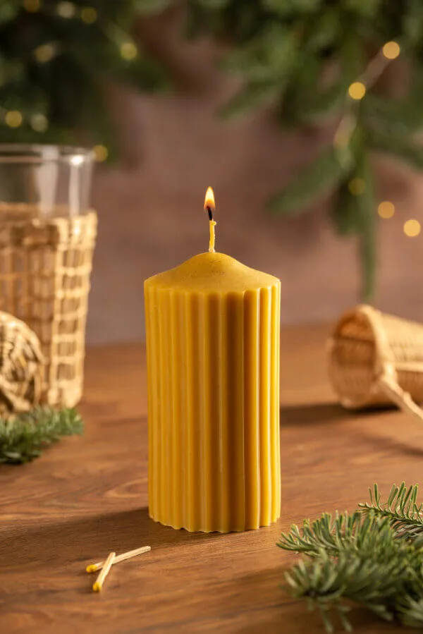 cylindrical beeswax candle