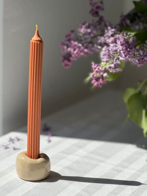Striped colored beeswax candle